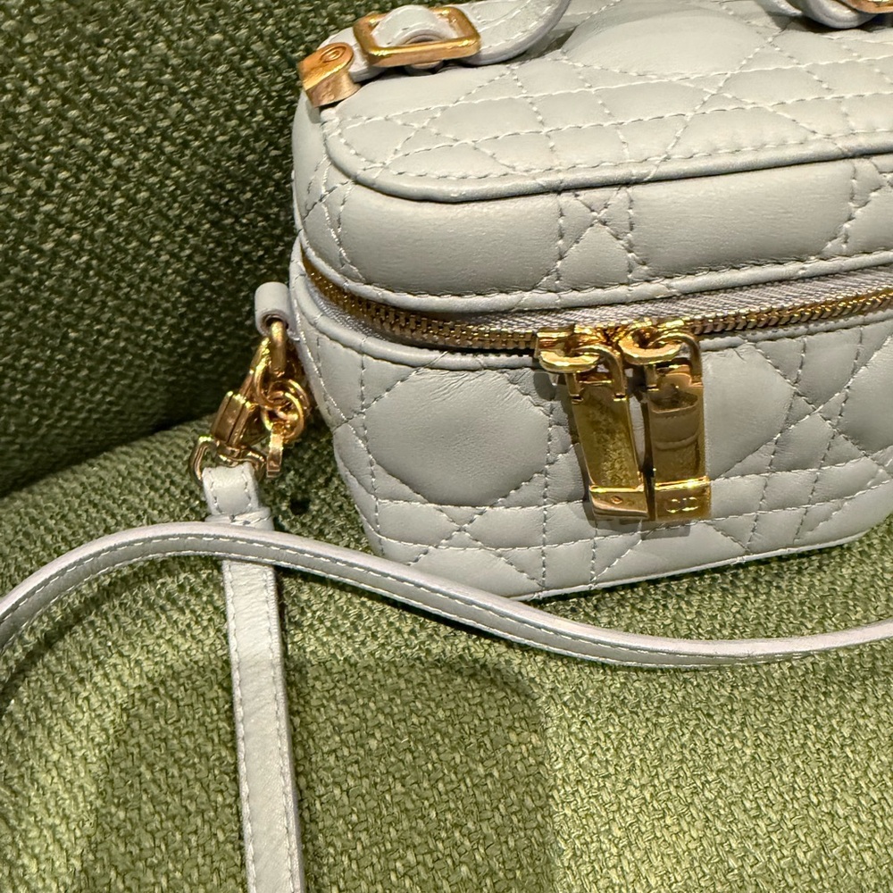 Elegant Quilted White Bag with Gold Accents